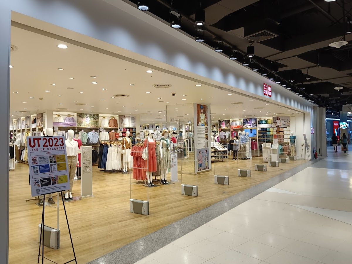 Interior of Central Pattaya shopping mall showing the multi-level atrium, exchange counters and banking services