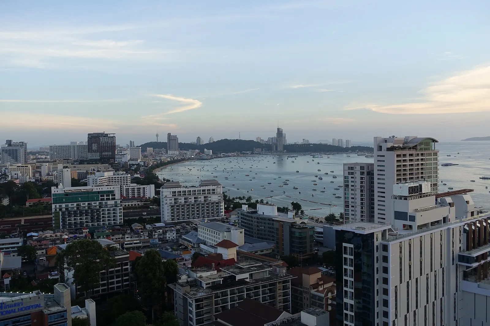 Central Pattaya Beach at sunset, with the sun over the Gulf