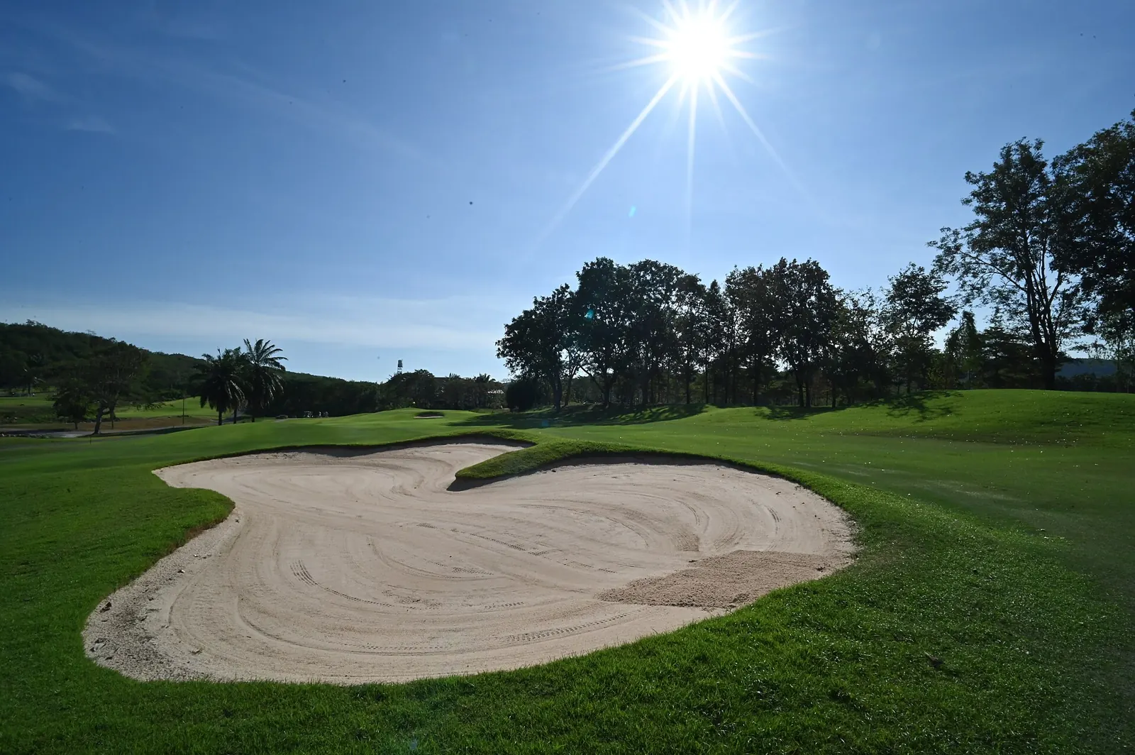 A raked sand bunker on a Pattaya-area golf course