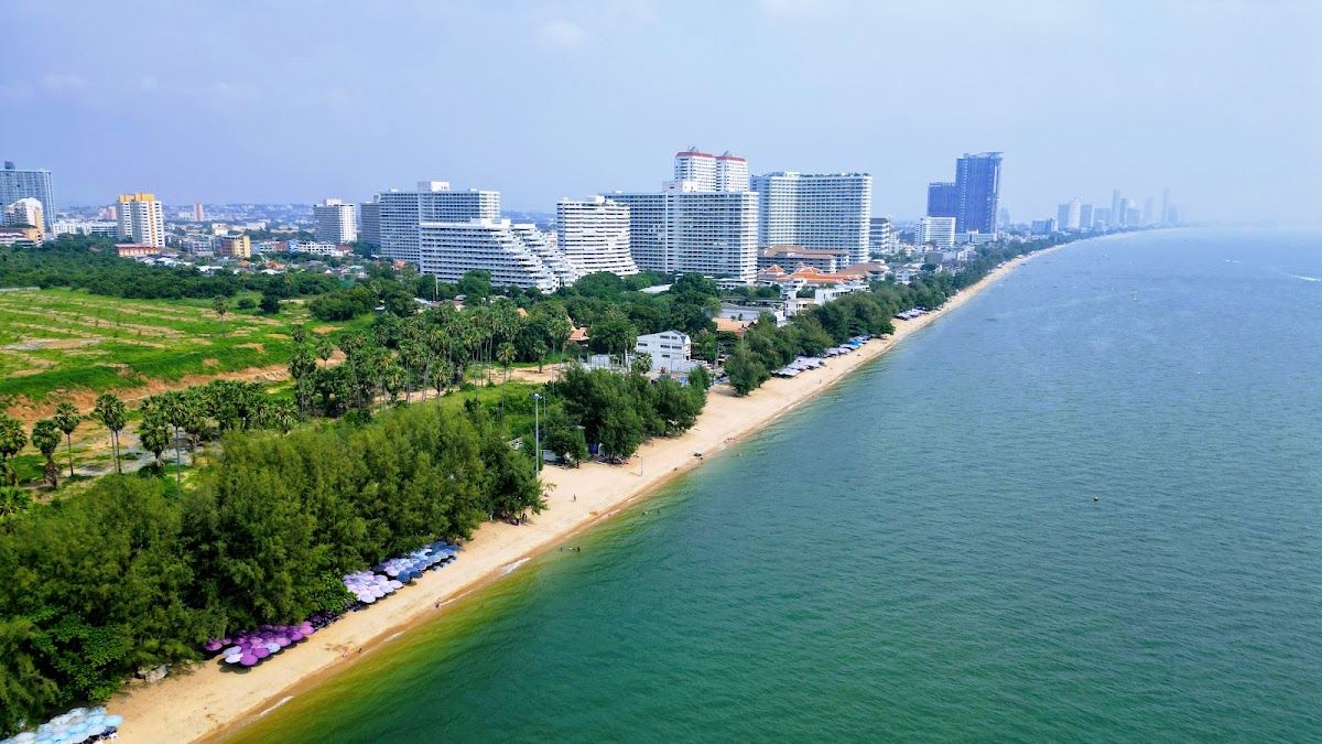 Aerial view of Pattaya Beach Road, its high-rise hotels and the curving bay